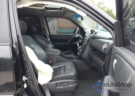 2010 Honda Pilot Touring из США, поврежденный, VIN 5FNYF4H91AB033801